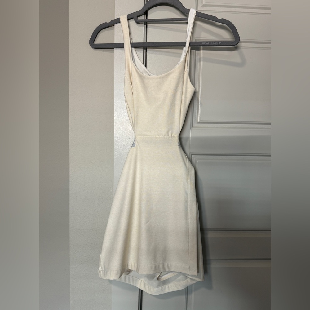 Never worn, extra small cream colored Outdoor Voices active wear dress!
